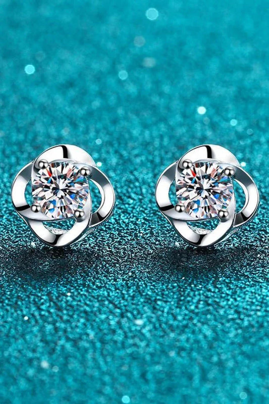 Pair of rhodium-plated moissanite stud earrings with a sleek, minimalist design