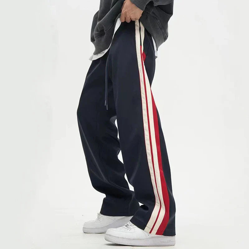 Relaxed fit straight leg trousers in black and dark blue colours, perfect for the modern gentleman's casual wardrobe