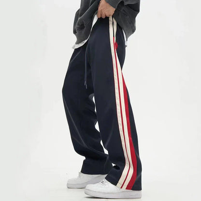 Relaxed fit straight leg trousers in black and dark blue colours, perfect for the modern gentleman's casual wardrobe