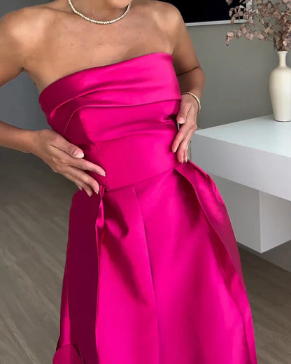 Elegant patchwork satin dress with sleek tube top, high-waist silhouette, and full-length swing skirt in vibrant rose red colour