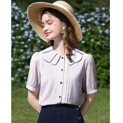 Elegant French puff sleeve blouse with timeless Peter Pan collar, available in purple and various sizes