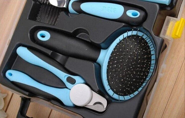 Premium UK pet grooming tool set with nail clippers, slicker brush, steel pin comb, deshedding tool, and retractable leash