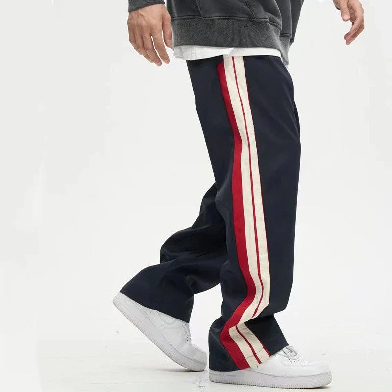 Relaxed fit straight leg trousers in black and dark blue colours, perfect for the modern gentleman's casual wardrobe