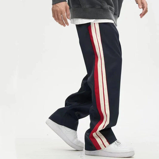 Relaxed fit straight leg trousers in black and dark blue colours, perfect for the modern gentleman's casual wardrobe