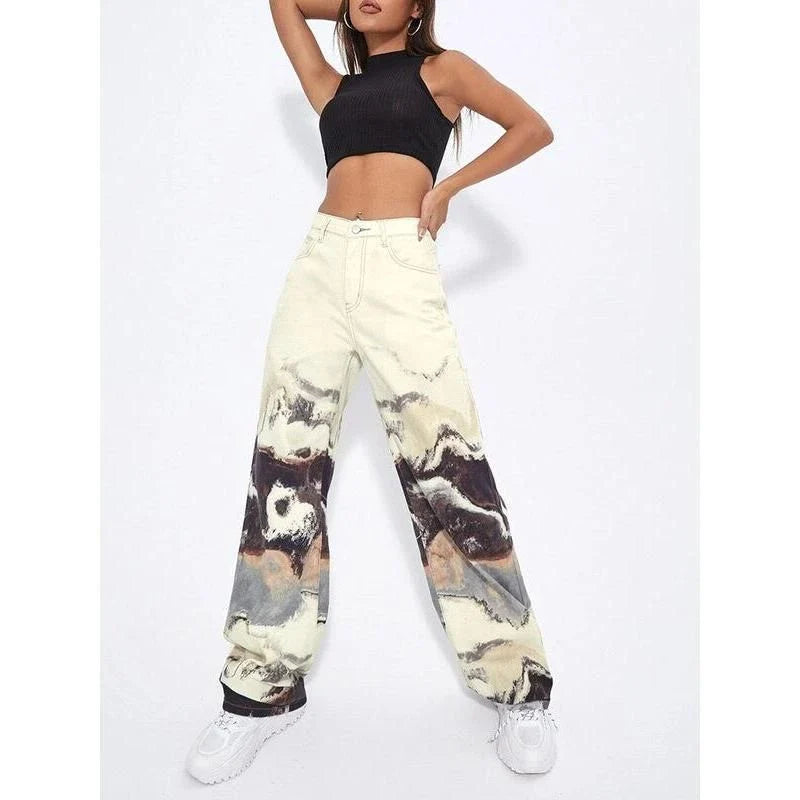 Stylish tie-dye wide-leg high-waist jeans in various sizes, featuring a unique colorblock design and premium denim fabric.