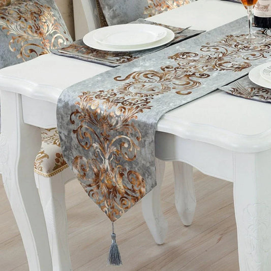 Elegant golden ornament table runner with intricate embroidery, adding a touch of regal charm to any dining setting.