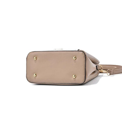 Sophisticated navy blue PU leather bucket crossbody bag with elegant patchwork design and adjustable strap