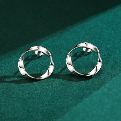 Stylish geometric silver earrings with an irregular circular design, crafted from premium 925 sterling silver for a modern, elegant look.
