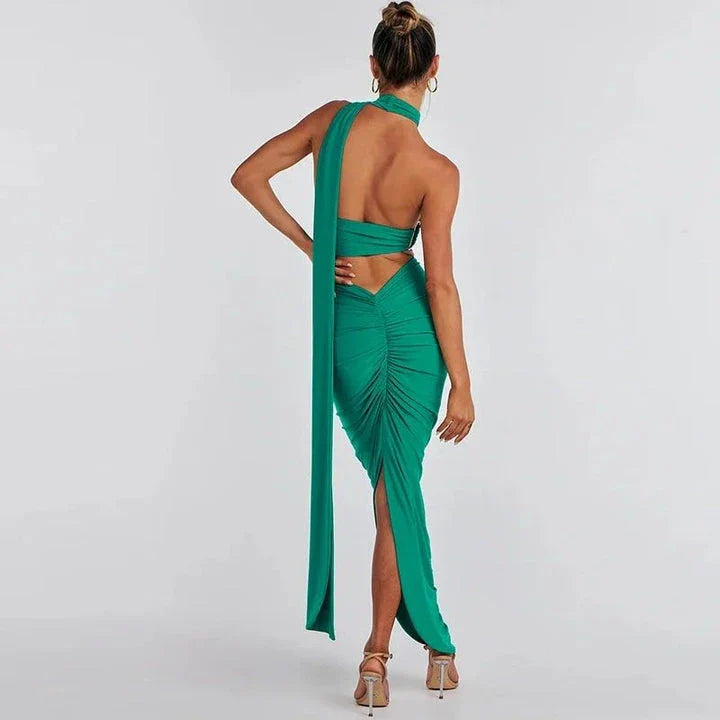 Glamorous backless cocktail dress set with halter-neck crop top and flowing maxi skirt in green colour