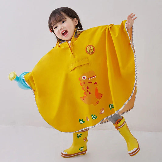A colourful dinosaur-themed waterproof rain poncho for children, designed to keep them dry and happy during outdoor activities.