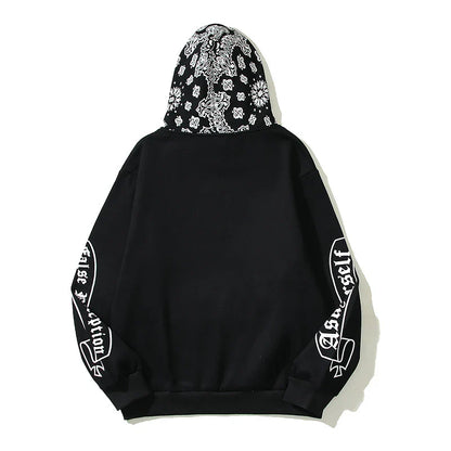 A cosy, fleece-lined hoodie with a classic paisley pattern, a relaxed fit, and practical side pockets for easy style and comfort.