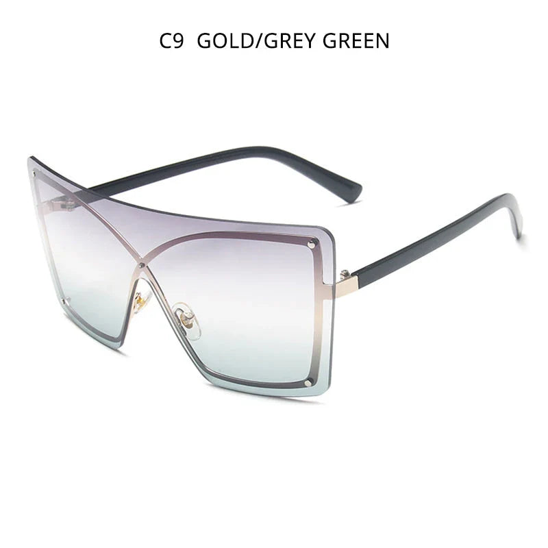 Fashionable oversized flat top sunglasses with gradient lenses and a sleek, rimless plastic frame