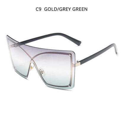 Fashionable oversized flat top sunglasses with gradient lenses and a sleek, rimless plastic frame