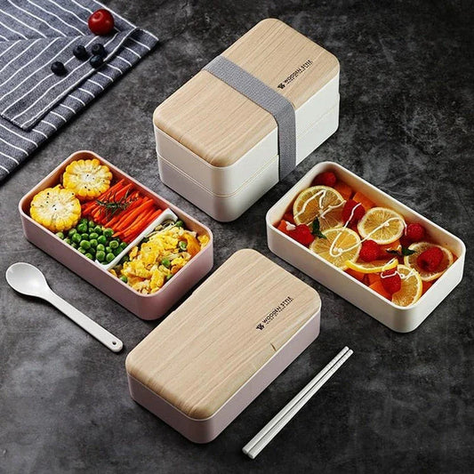 Premium BPA-free double-layer lunch box with stainless steel spoon and chopsticks, perfect for office, picnics, and on-the-go dining