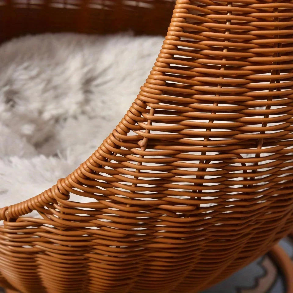Cosy hanging cat hammock bed with soft, plush materials and sturdy metal frame, providing a comfortable and secure space for cats to nap and observe their surroundings.