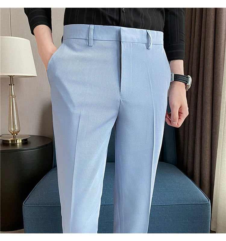Premium men's suit trousers in a variety of colours, featuring a subtle textured drape and exceptional stretch for all-day comfort and style.