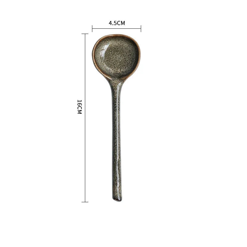 Elegant ceramic soup spoon with long handle and vibrant grey glaze, perfect for refined dining experiences