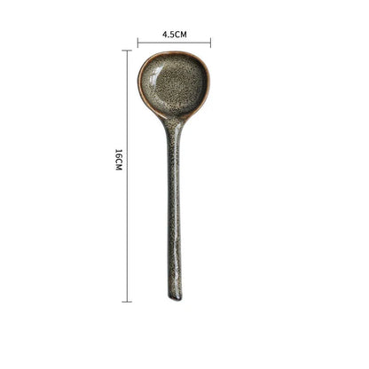 Elegant ceramic soup spoon with long handle and vibrant grey glaze, perfect for refined dining experiences