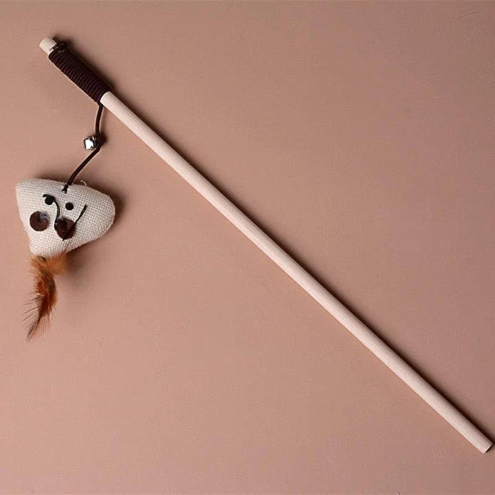 A wooden cat toy with a ball-shaped design, designed to engage cats in playful chasing and swatting activities.