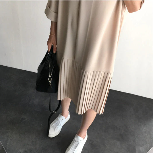 Premium Pleated Suit Dress in Timeless Beige featuring a V-neck, long sleeves, and a mid-length skirt with unique fold stitching detail