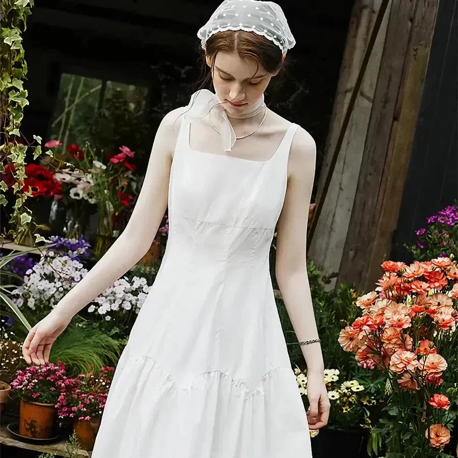 Elegant French White Suspender Long Dress with a relaxed A-line silhouette and premium cotton fabric