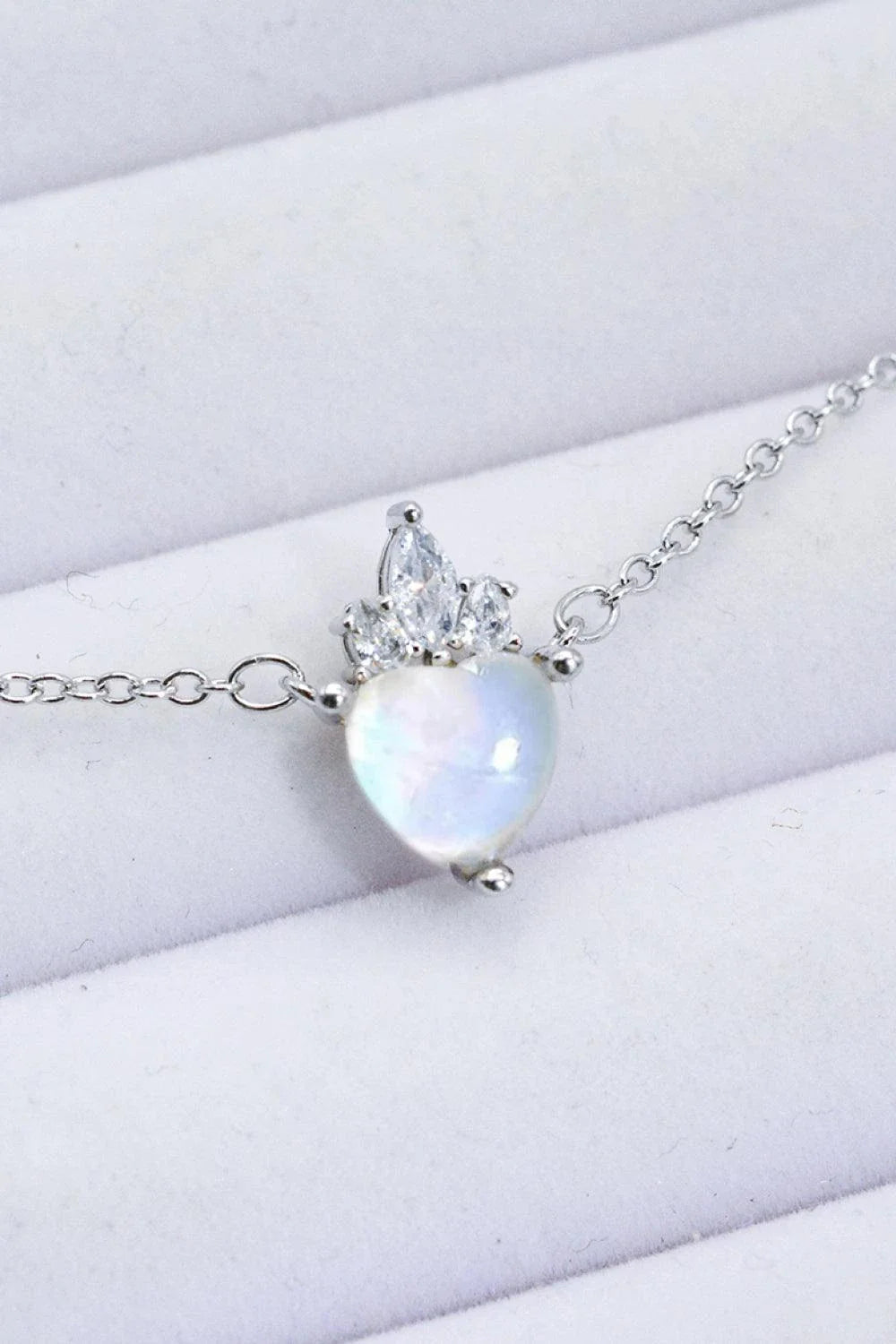 Sterling silver necklace with a natural moonstone heart-shaped pendant