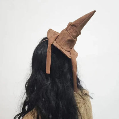 Sortband Halloween Witch Hat Headband in red, green, and brown colours with a detachable witch hat design