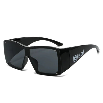 Oversized square sunglasses with black lenses and a durable plastic frame, offering UV400 protection and adaptive photochromic technology.