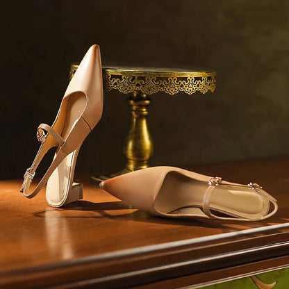 Elegant women's high heel sandals made from genuine leather with a stylish square heel and buckle strap closure