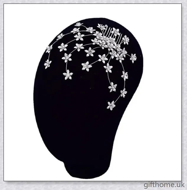 Elegant silver bridal hair comb adorned with sparkling rhinestones, a perfect accessory for weddings and formal events
