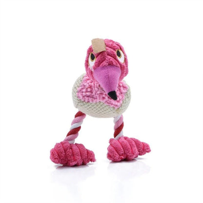 A plush, bird-shaped dog toy in a pink colour. It is designed to encourage chewing and snuggling behaviour in dogs.