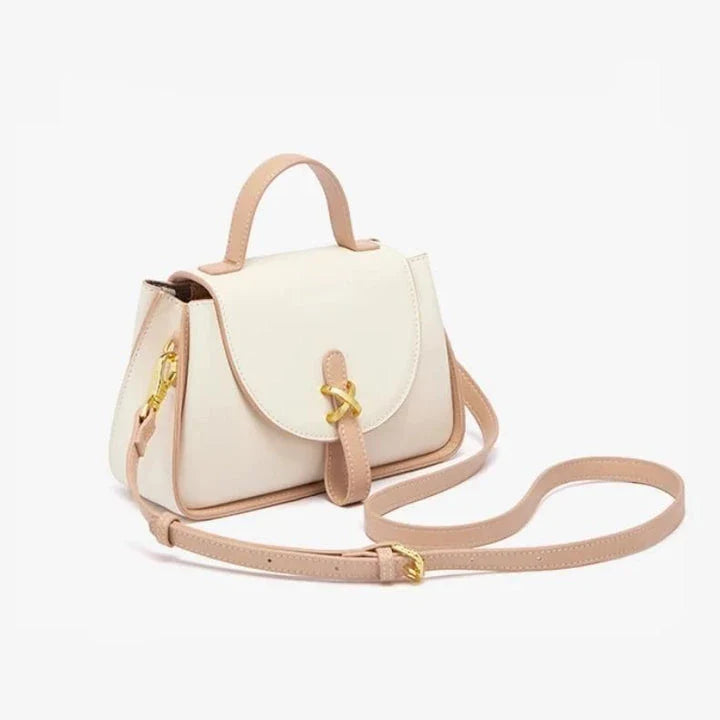 Luxury leather shoulder bag for women, featuring a sleek design, spacious interior, and premium split leather construction.