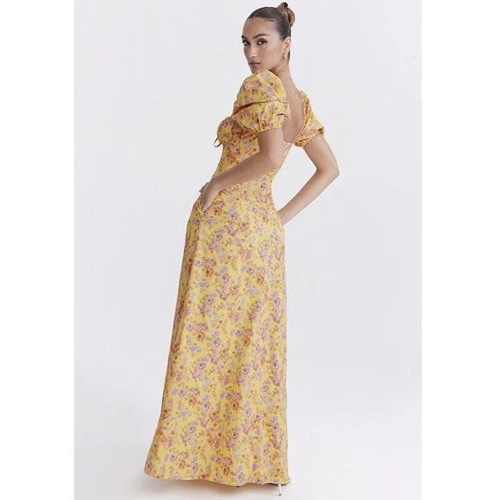 Elegant long maxi summer dress in blue with a flattering fit and flare silhouette, perfect for parties and nights out.