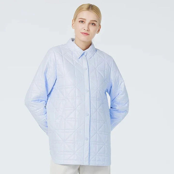Fashionable women's quilted cotton jacket in beige with functional pockets and chic zippers for a sophisticated, casual look