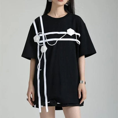 A stylish black and white floral half-sleeve casual t-shirt with a classic round neckline, perfect for everyday wear.