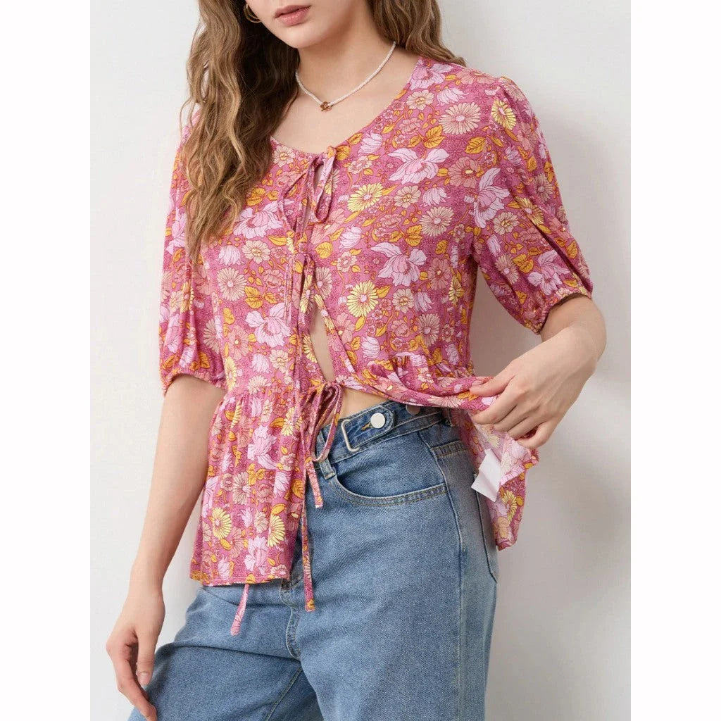 Elegant floral lace blouse with bow v-neck, showcasing vintage charm and modern comfort