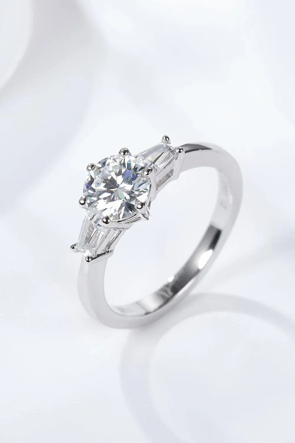 Captivating moissanite and platinum-plated ring with a sleek, minimalist design