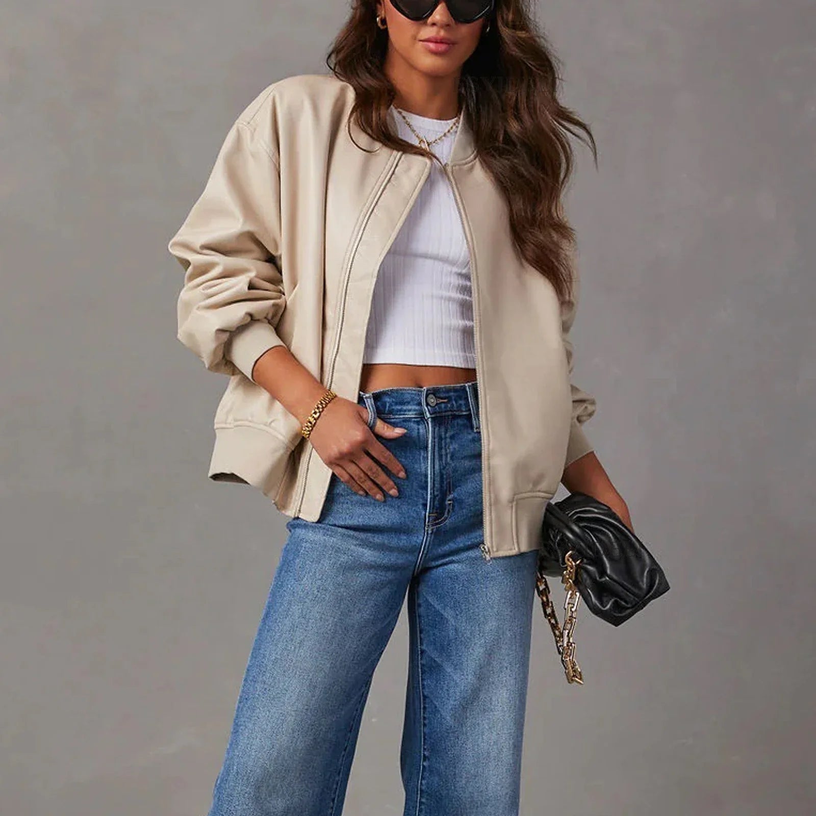 Stylish leather baseball jacket with Peter Pan collar, perfect for casual British streetwear