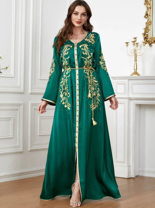 Elegant long-sleeve dress with floral embroidery in a sophisticated sapphire blue colour, suitable for British women