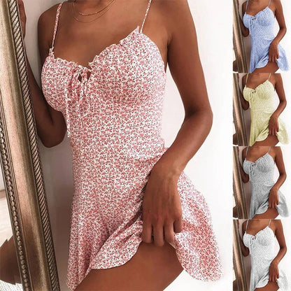 Floral mini dress with vibrant prints, soft polyester fabric, and a flattering silhouette for a stylish look.