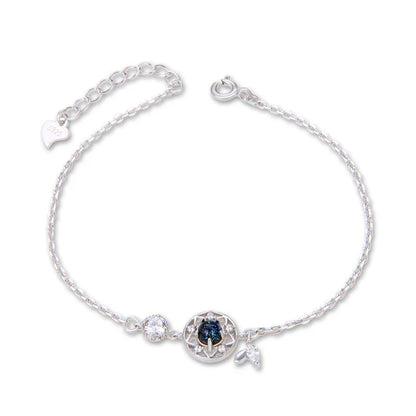 Enchanting sterling silver bracelet with genuine moonstone and celestial motifs