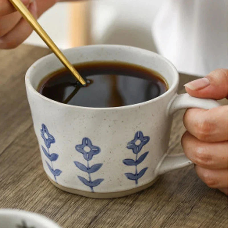 Elegant hand-painted Japanese-inspired ceramic coffee mug with intricate floral design