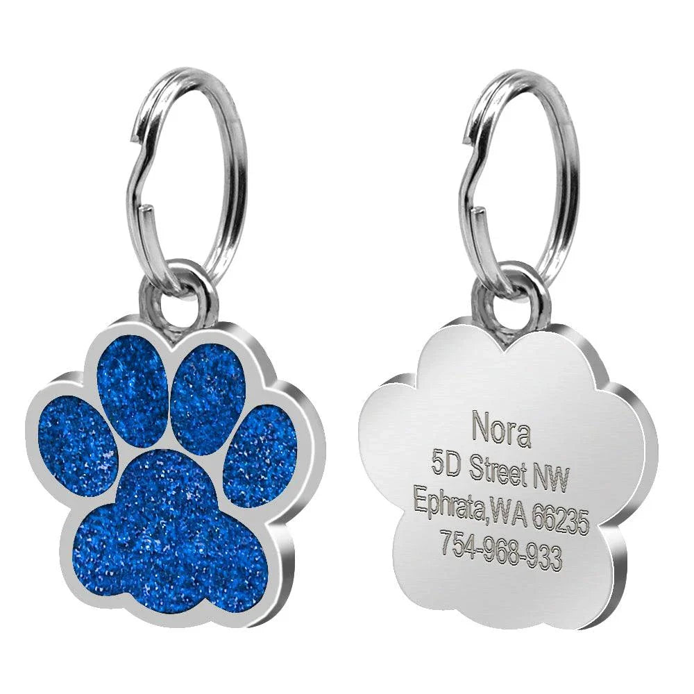 Paw-shaped pet ID tag with rhinestone embellishments, designed for safety and style