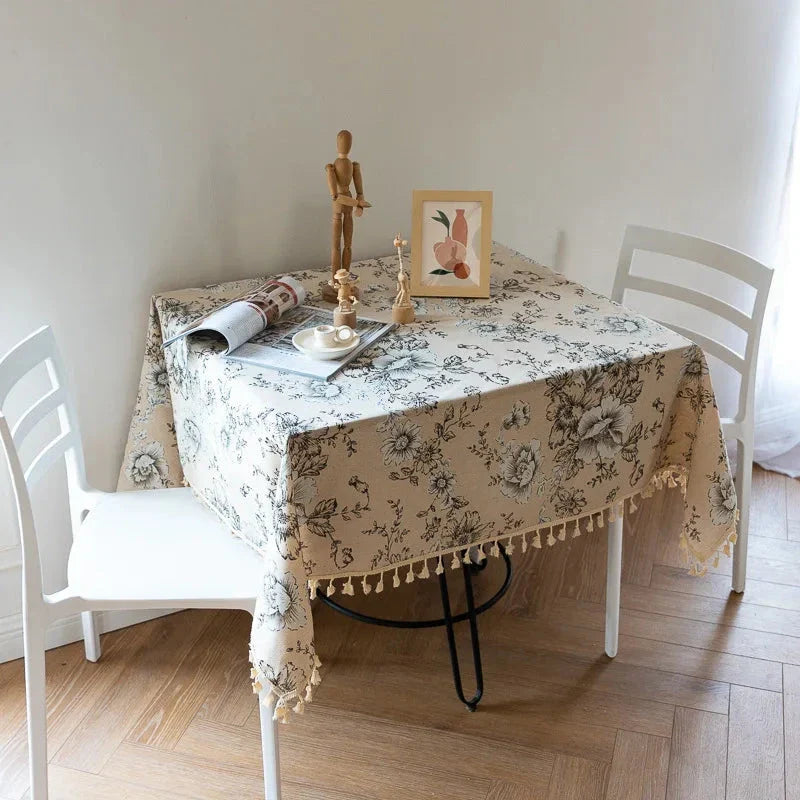 Peony print cotton-linen tablecloth with tassels, suitable for elegant home décor and dining experiences