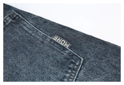 A pair of stylish retro-inspired Japanese jeans in black and grey, featuring a mid-rise waist and straight leg silhouette for a flattering, comfortable fit.