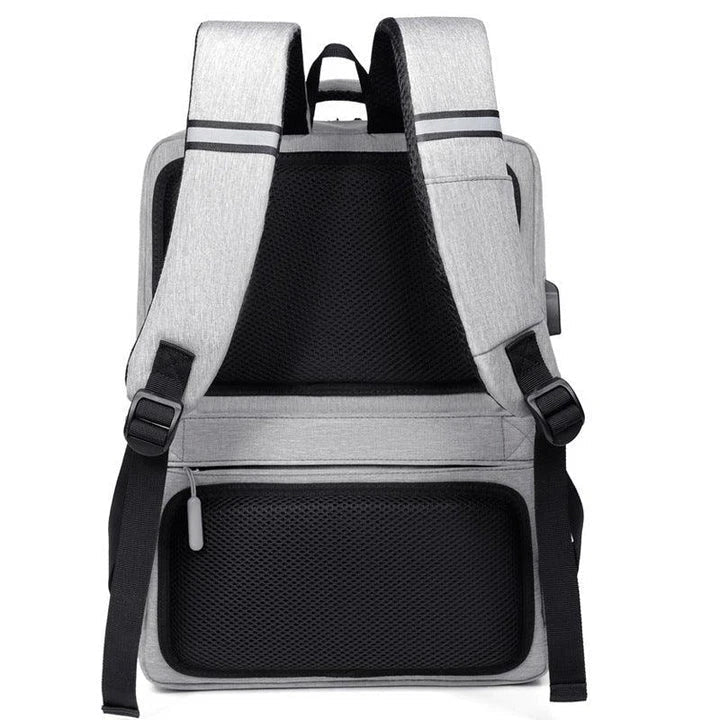 Premium laptop backpack in light grey colour, featuring a sleek and durable polyester design with multiple compartments for organised storage.