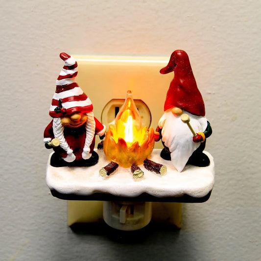 A cosy, glowing Christmas night lamp with a warm, festive ambience