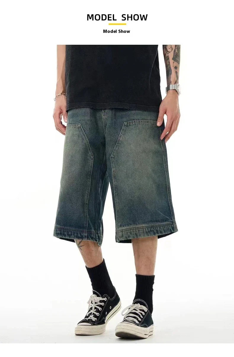 Relaxed-fit men's denim shorts in a vintage blue wash, featuring a wide-leg silhouette and adjustable waistband for maximum comfort.