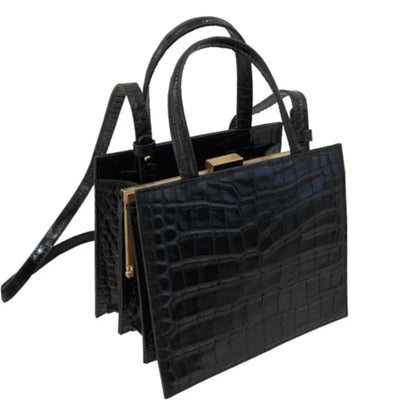 Retro one-shoulder messenger bag for women, made with premium PU materials and featuring a classic vintage-inspired design.