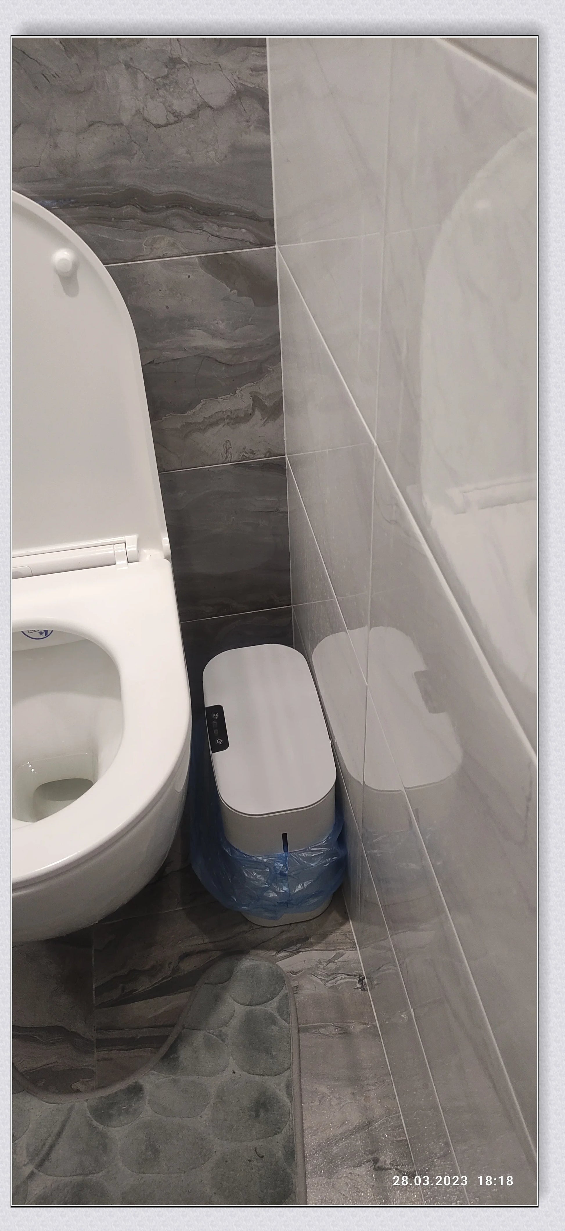 Sensor-powered bin with sleek design and touch-free motion-activated lid for effortless, hygienic waste disposal